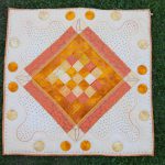 Quilt orange Rauten